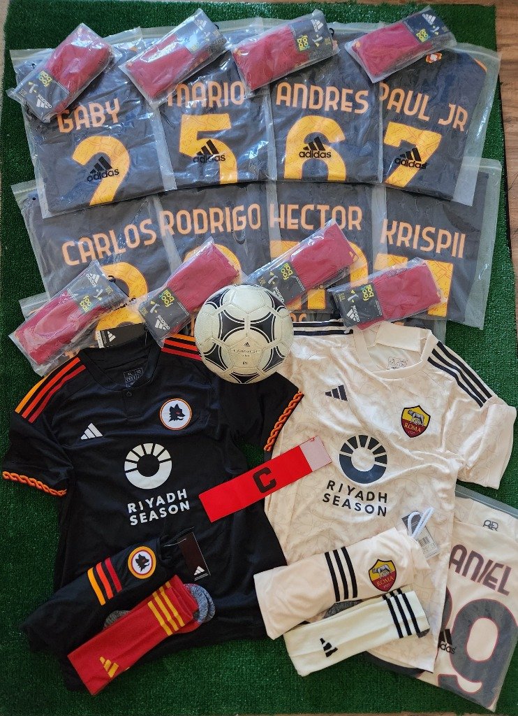 Dark custom jerseys with player names and numbers